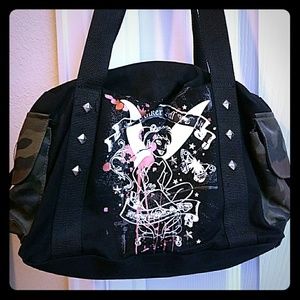 4 pocket purse or mini duffel bag